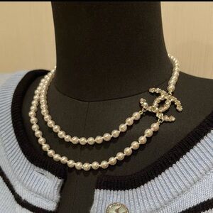 CHANEL Pearl Necklace with Gold Logo